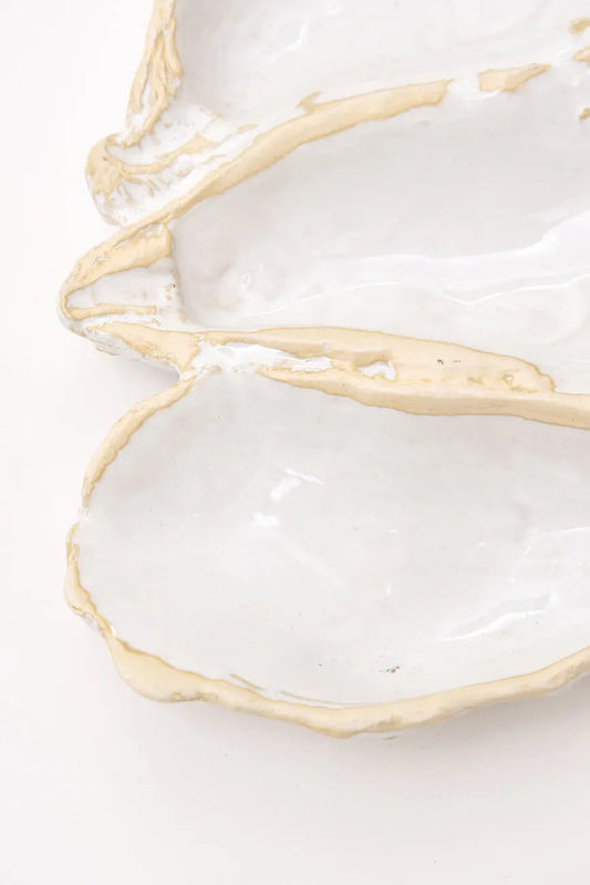 Oyster-shaped ceramic bowl