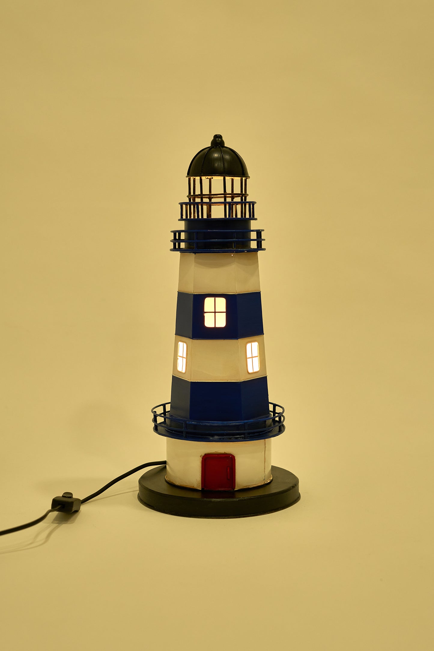 Blue and white metal lighthouse lamp
