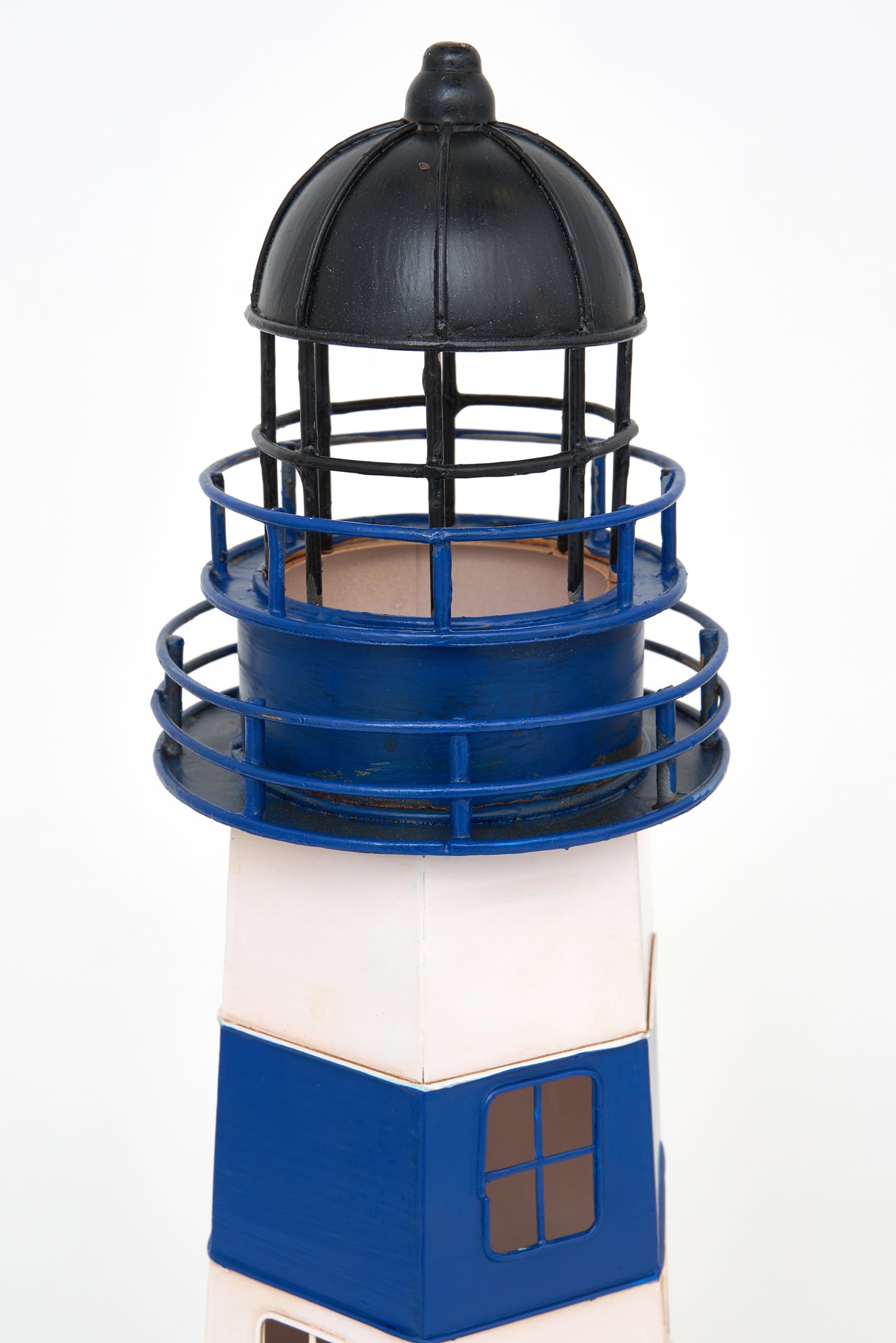 Blue and white metal lighthouse lamp