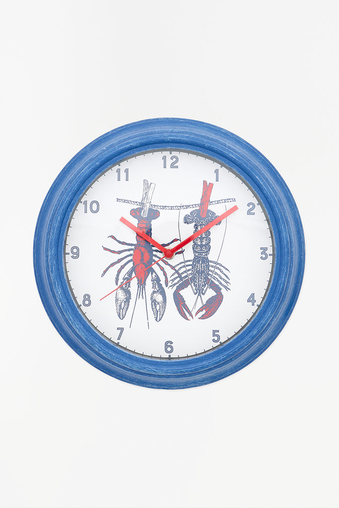 Reloj con diseño de langostas