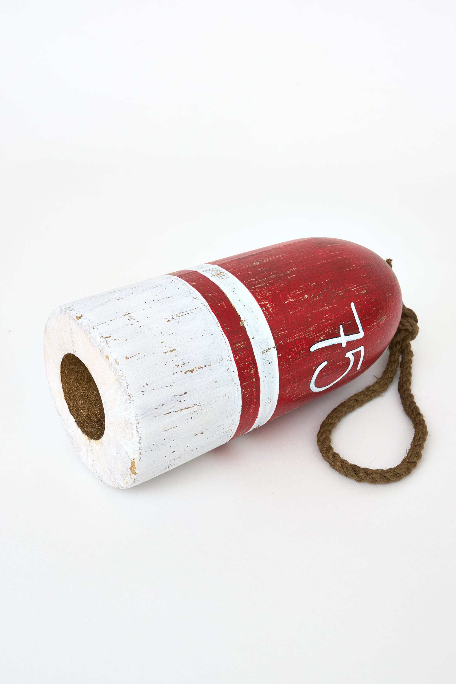 Decorative red buoy with nautical inspiration