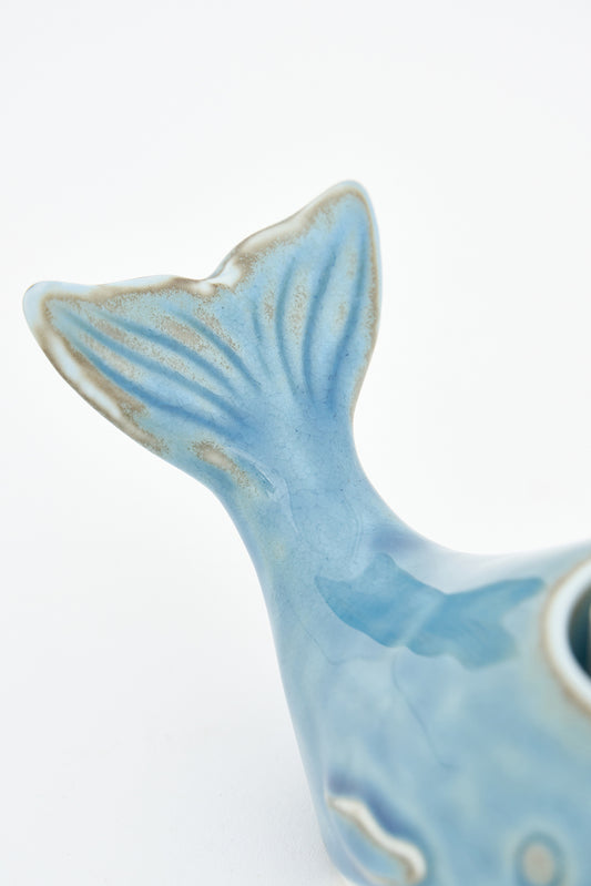 Whale-shaped candle holder in blue porcelain