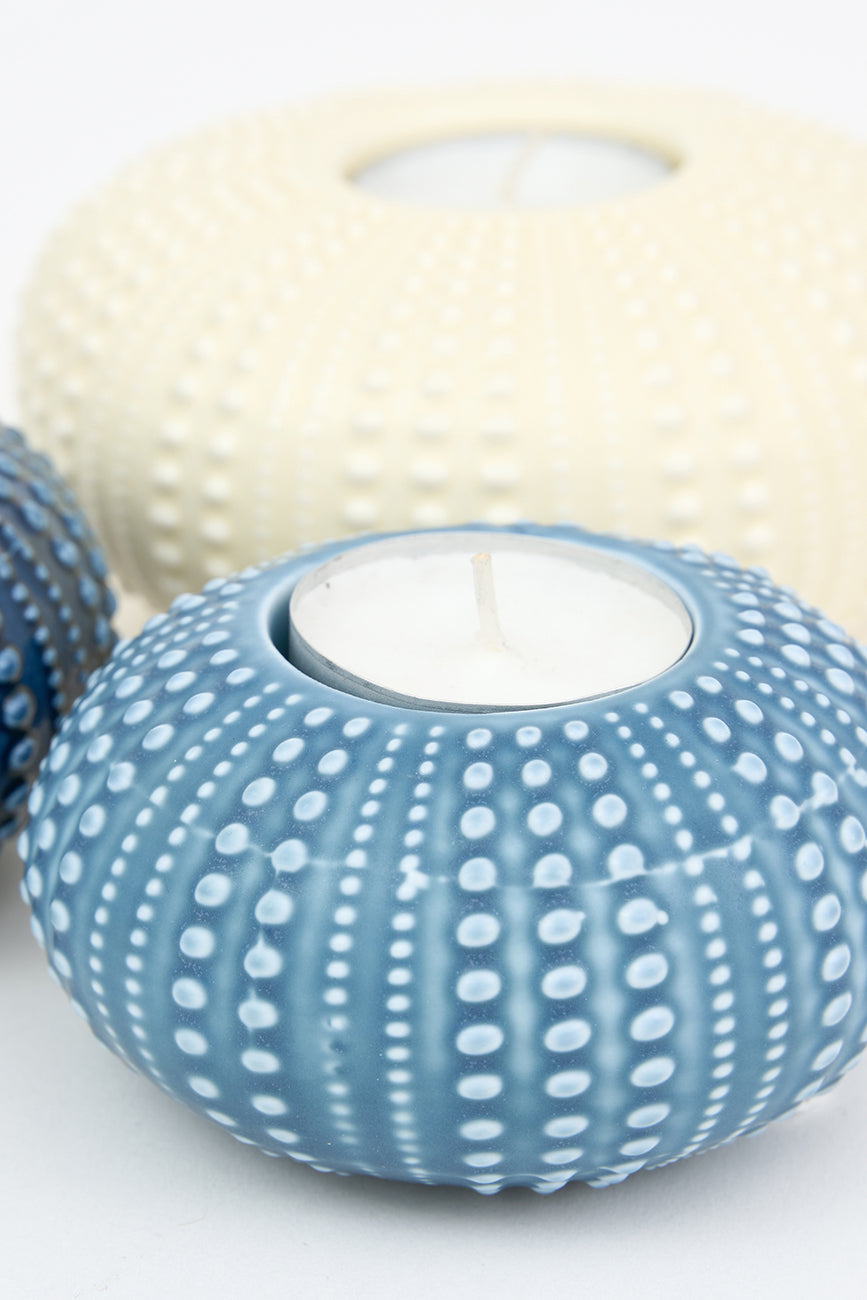 Sea urchin candle holder in light blue ceramic