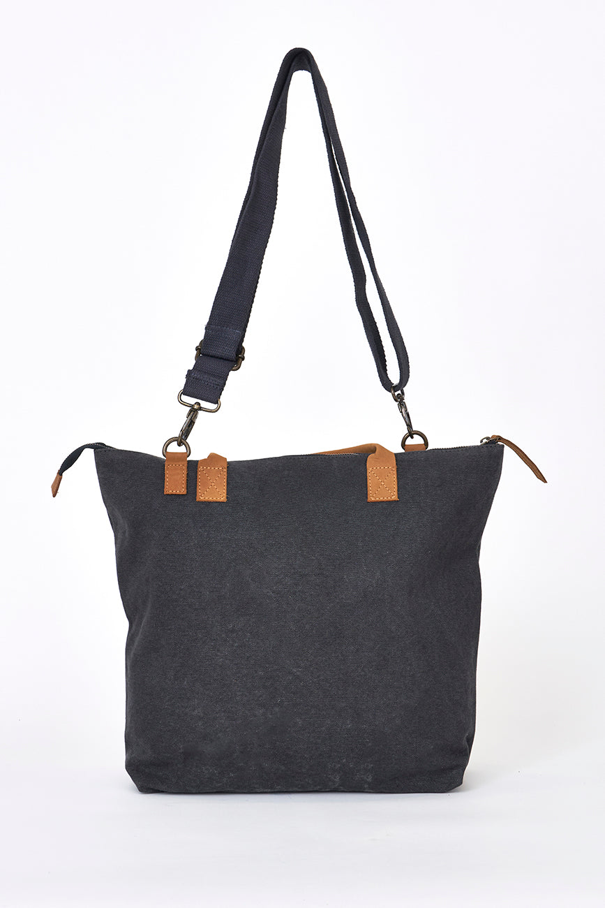 Green canvas bag with striped lining