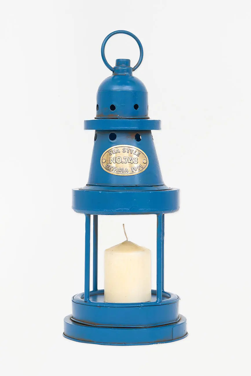 Portavelas forma de faro en metal