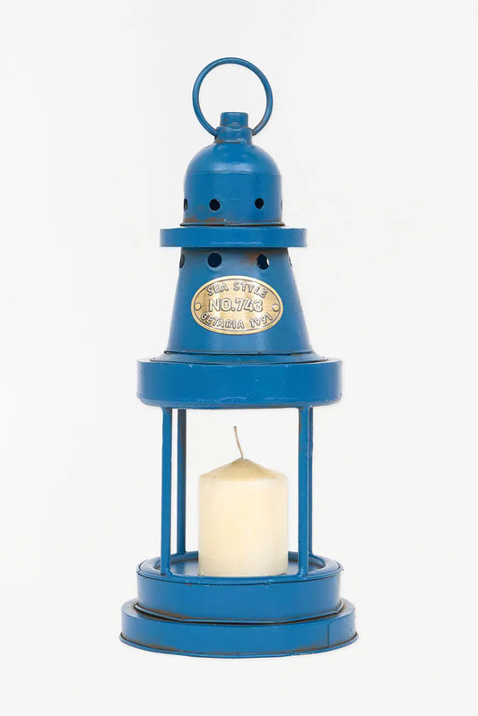 Portavelas forma de faro en metal