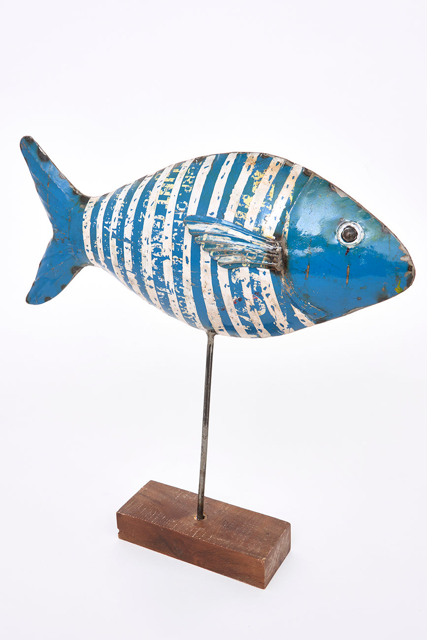 Decorative fish made of recycled metal with a wooden base