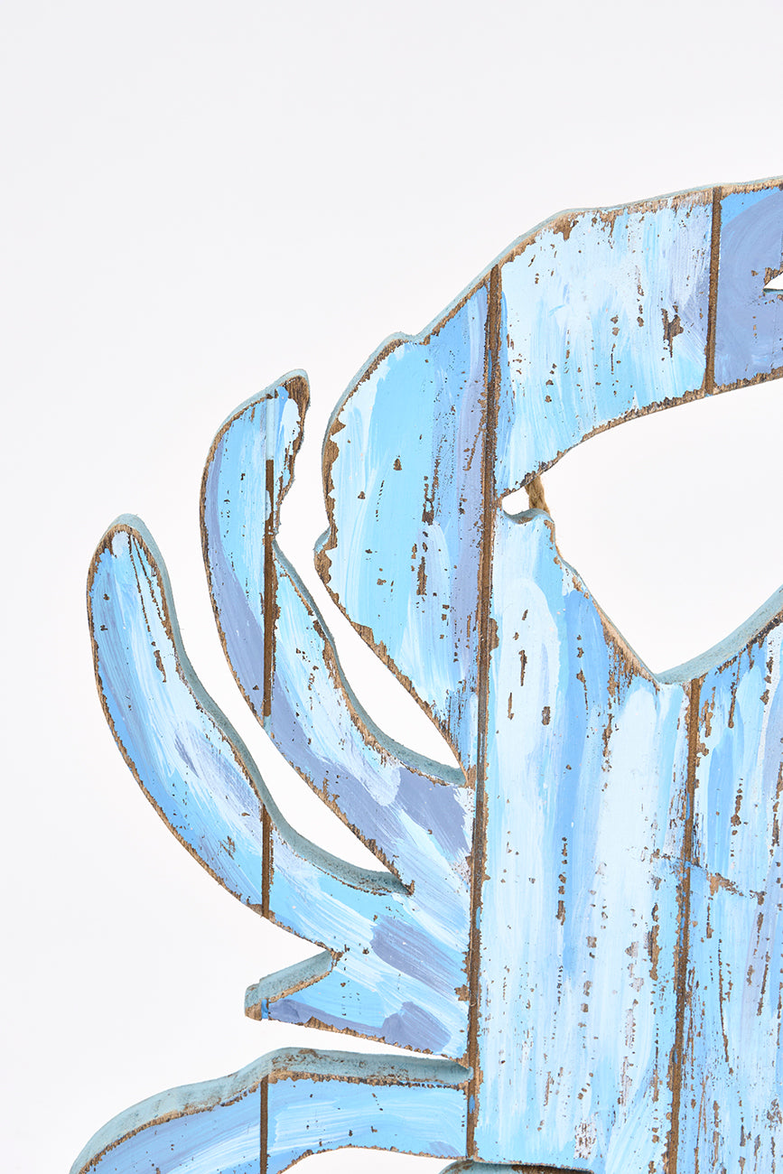 Suspension en bois en forme de crabe