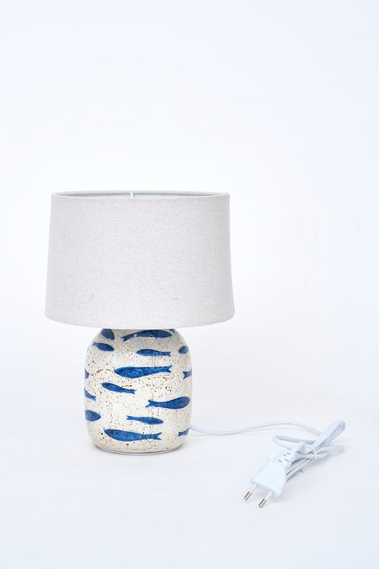 Lámpara de terracota con peces pintados