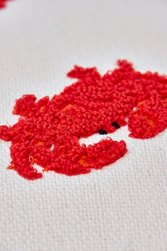 Cojín de algodón con cangrejos bordados