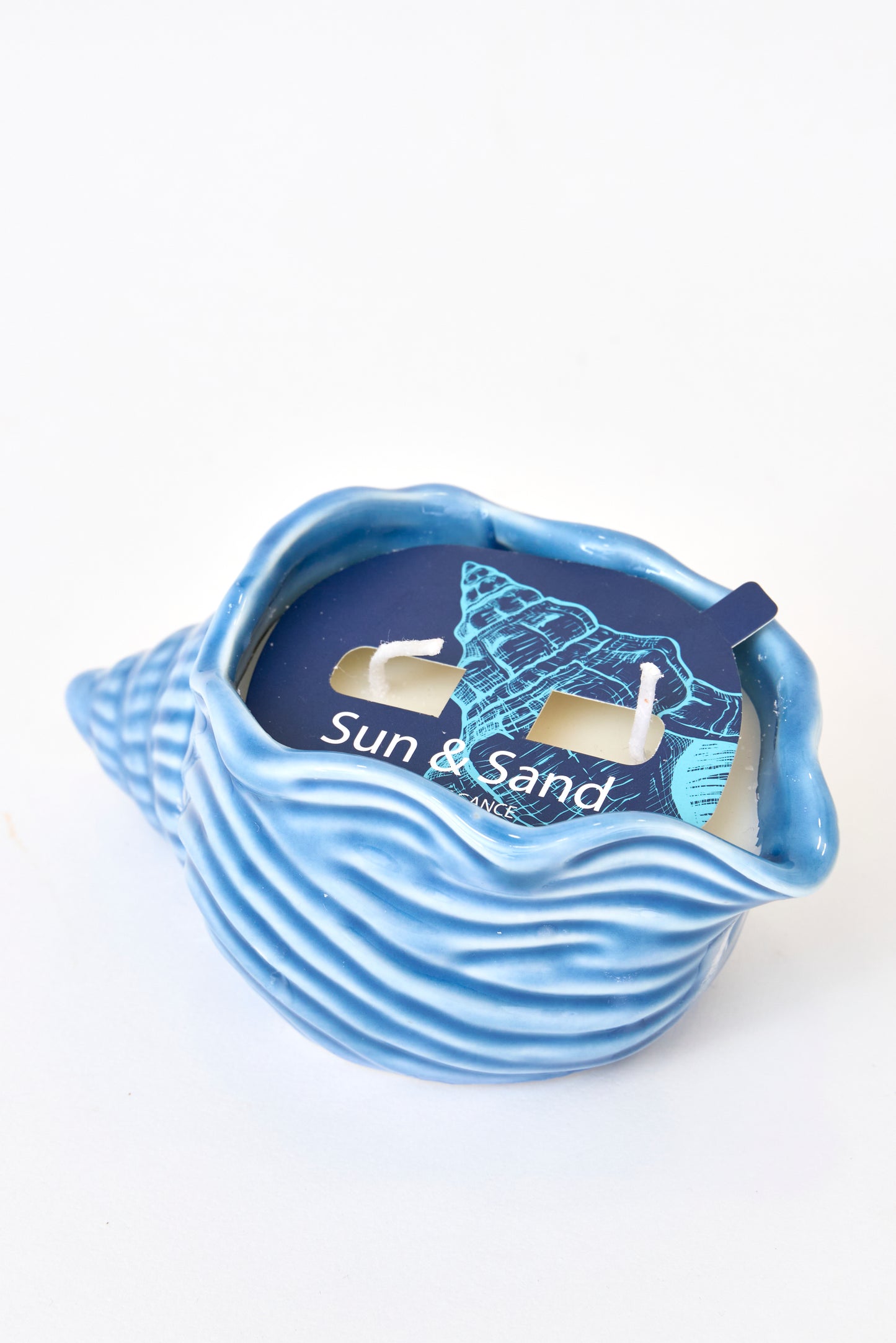 Vela en caracola de cerámica