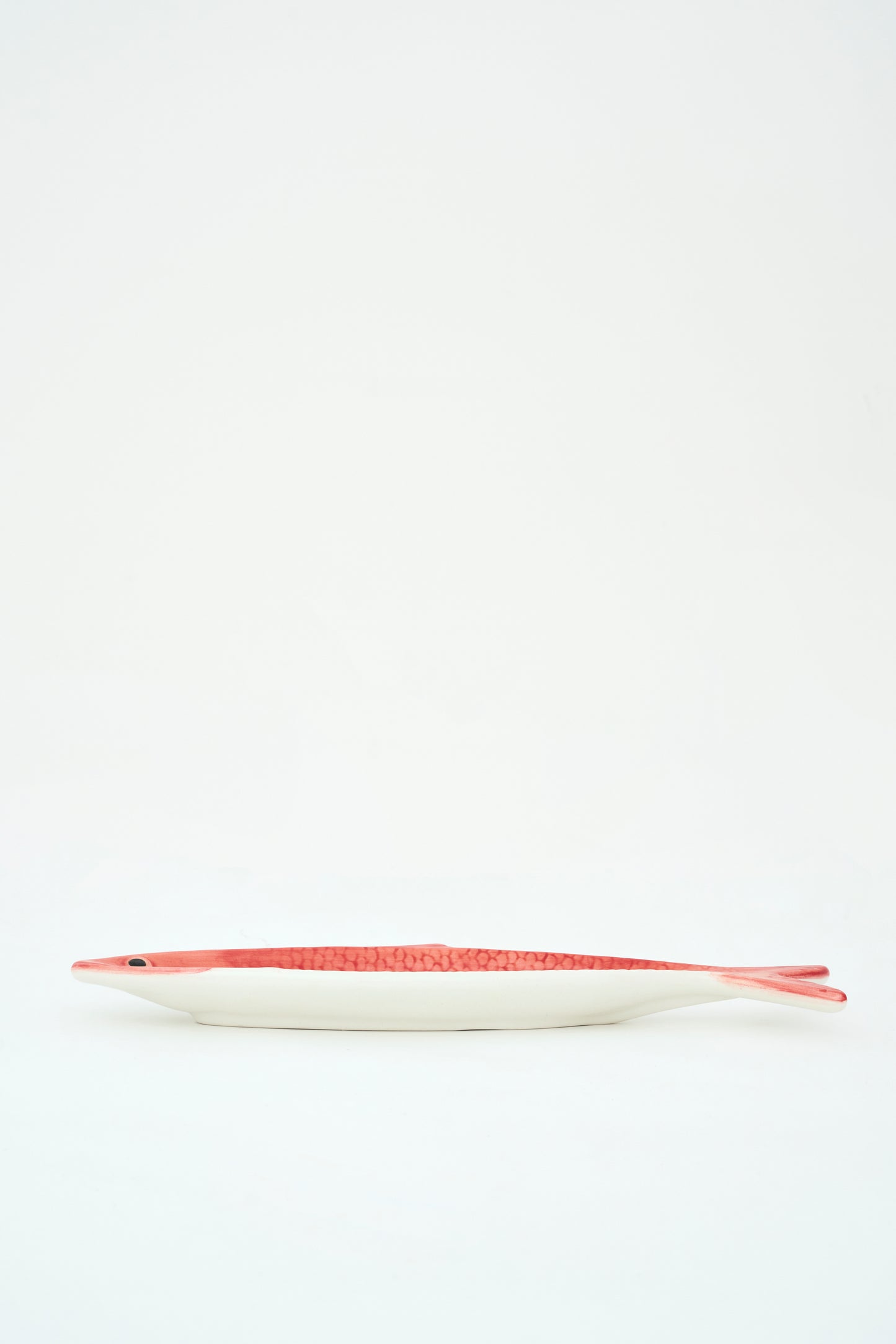 Arrain-forma duen dolomitazko platera