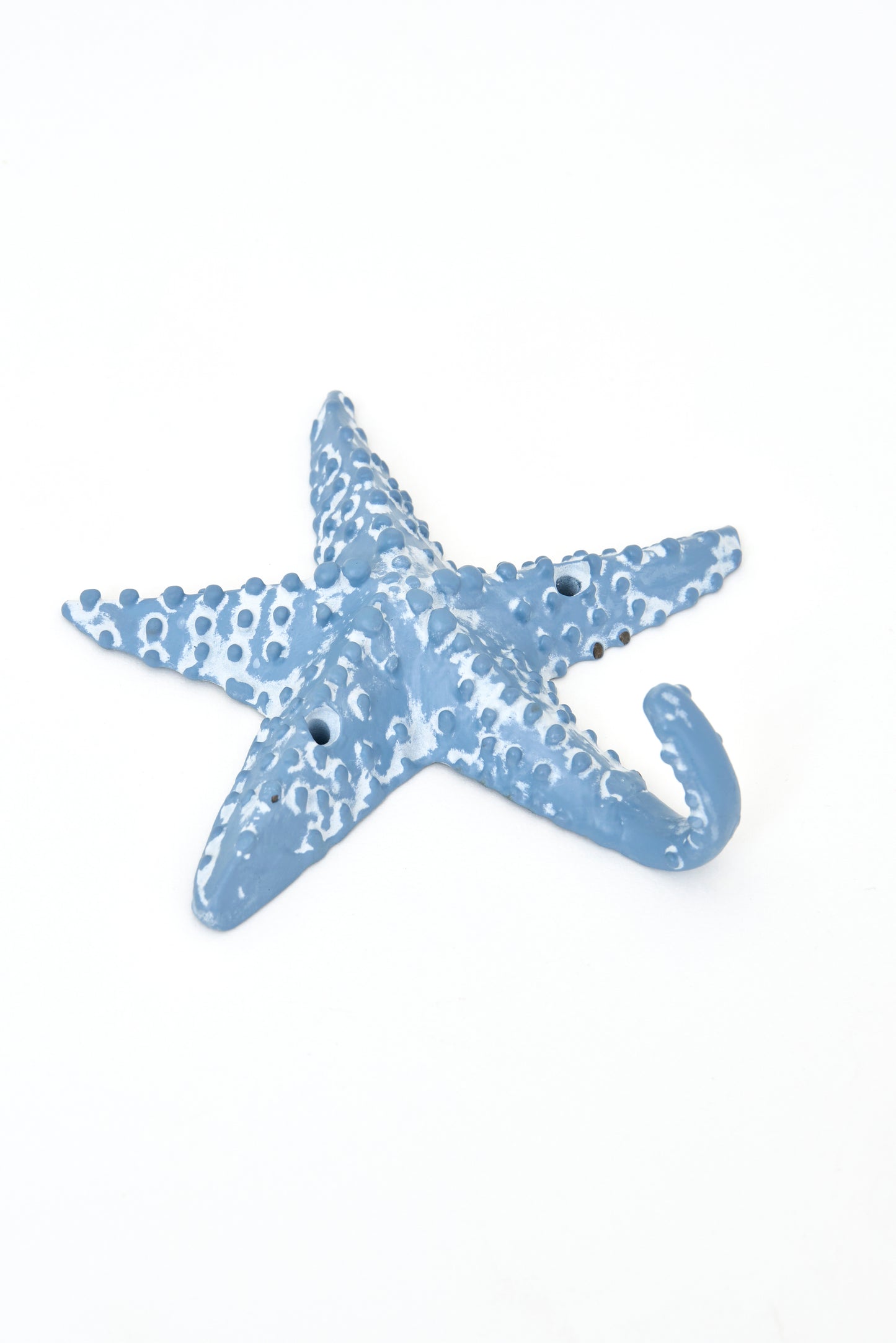 Colgador de metal con forma de estrella de mar