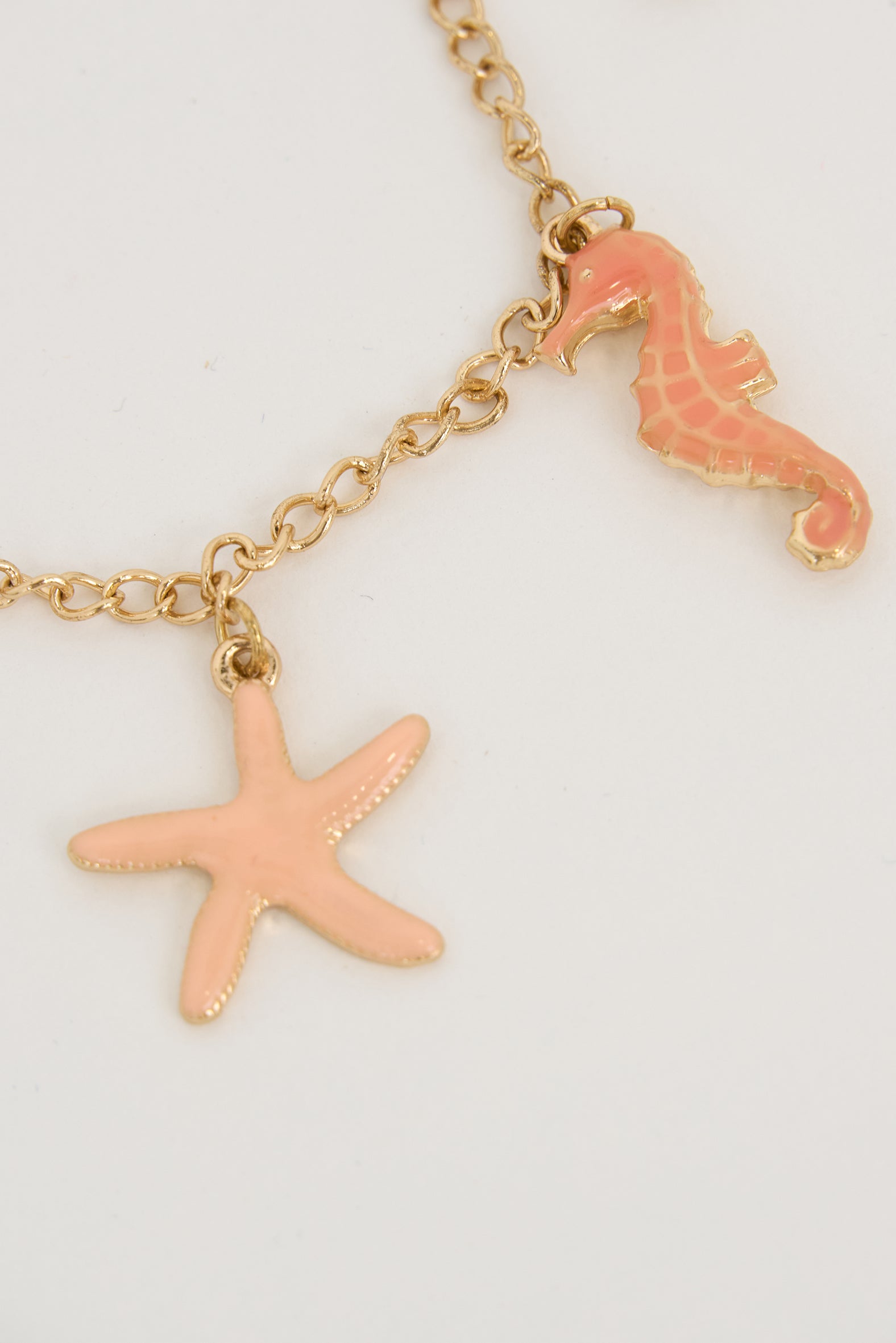 Gold-plated stainless steel bracelet with marine motifs