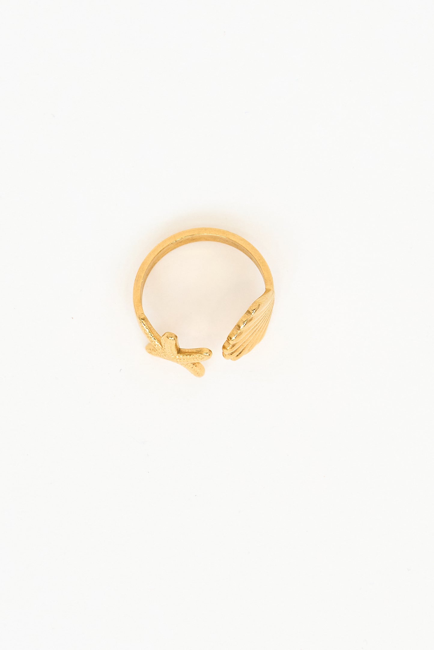 Gold ring with marine details at the ends