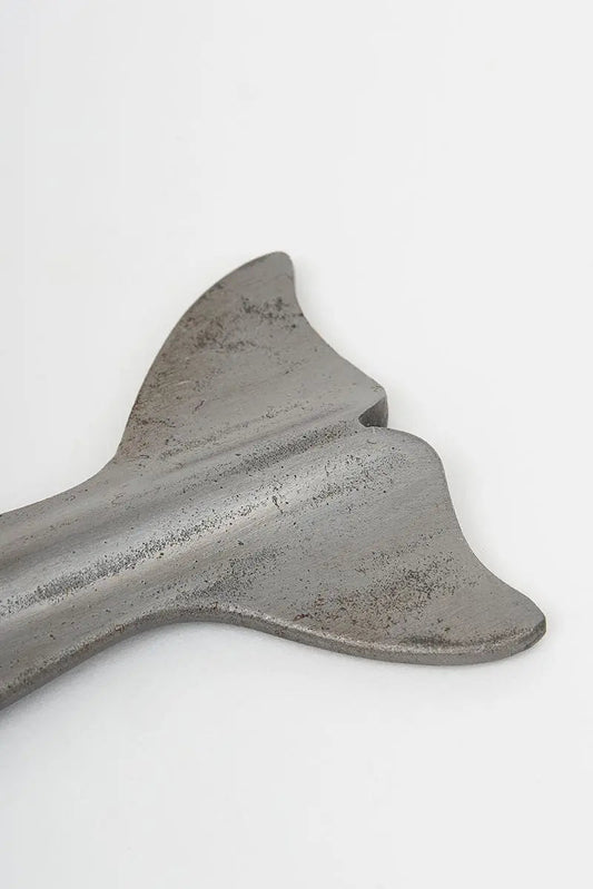 Abrebotellas con forma de cola de ballena