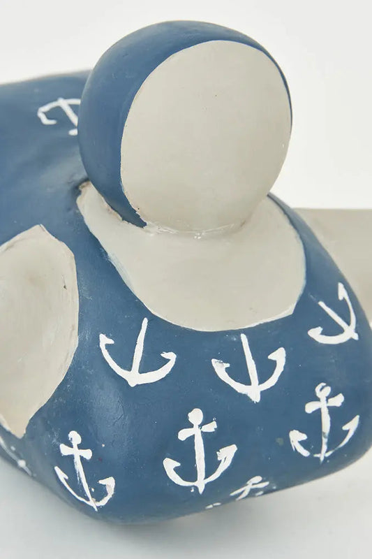 Figura de cemento bañista bañador con anclas