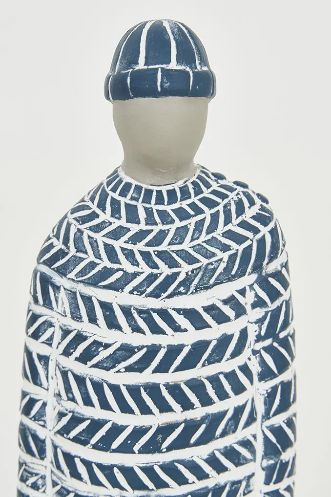 Figura de cemento marinero pintada de azul