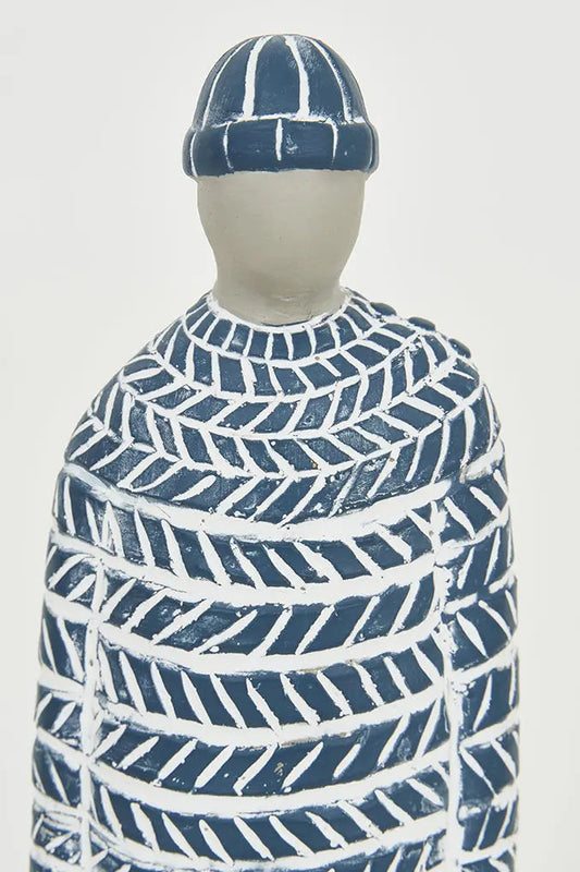 Figura de cemento marinero pintada de azul