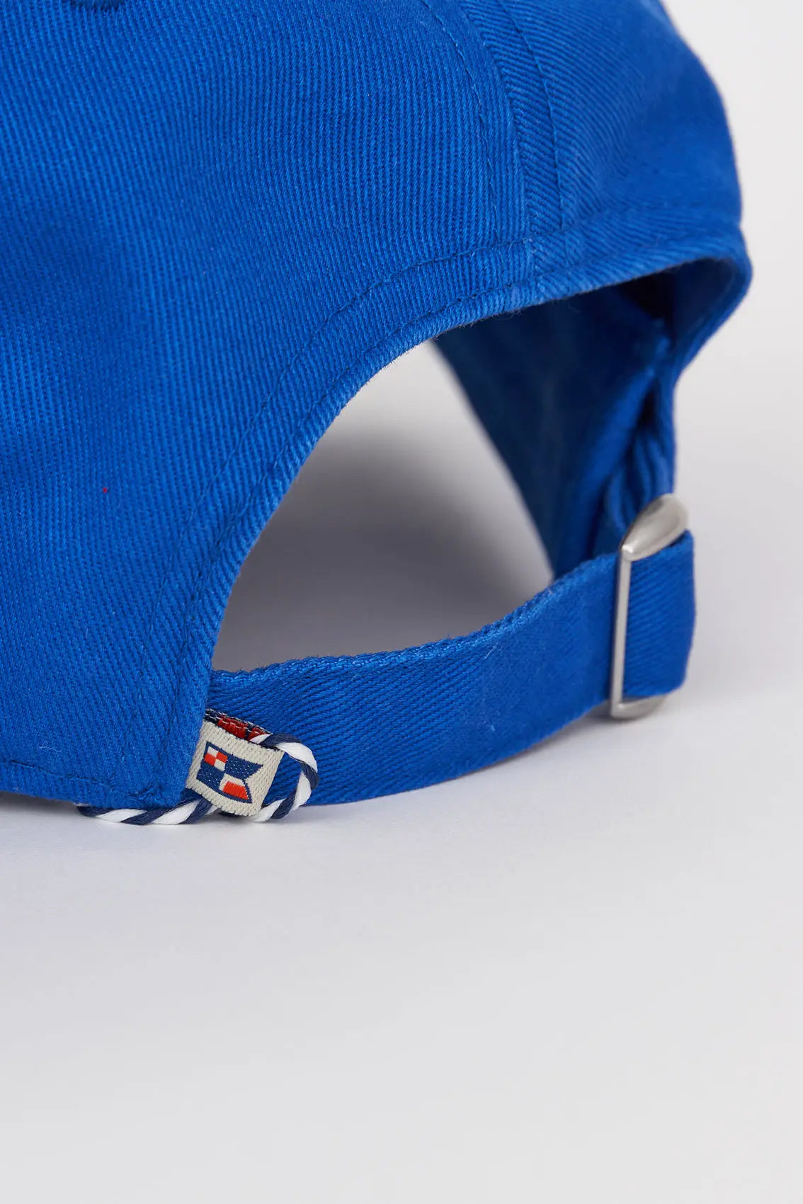 Cotton cap with embroidered rudder