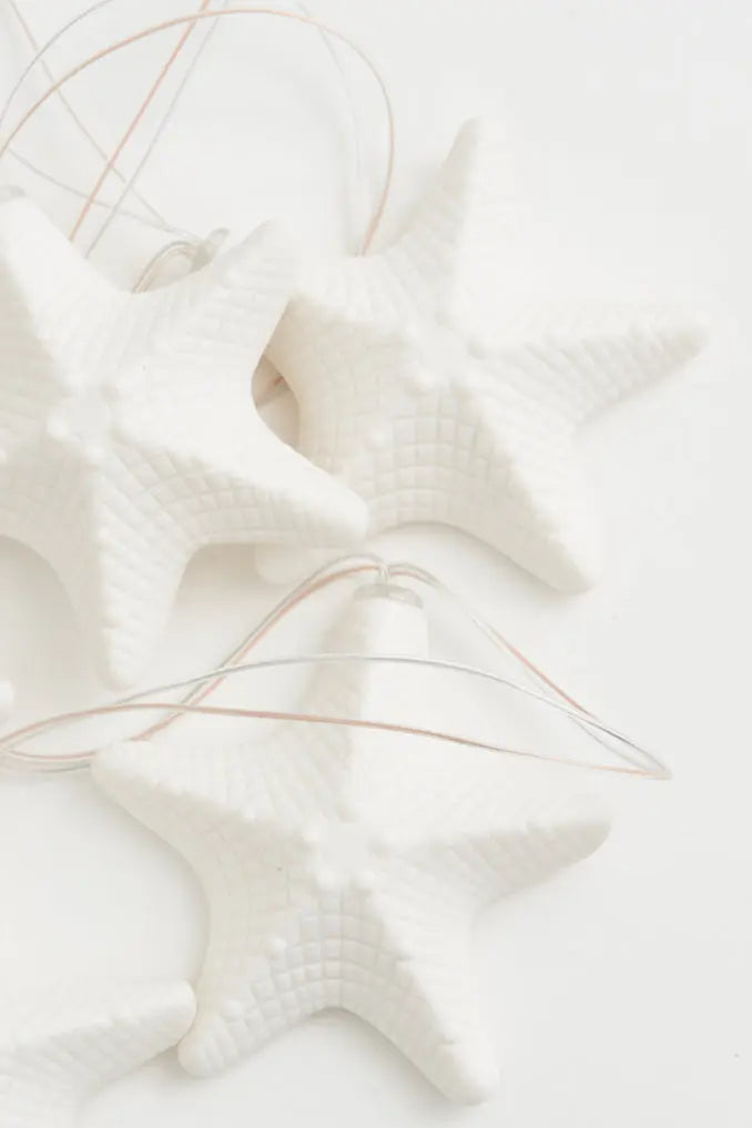 Guirnalda de farolillos con estrellas en resina