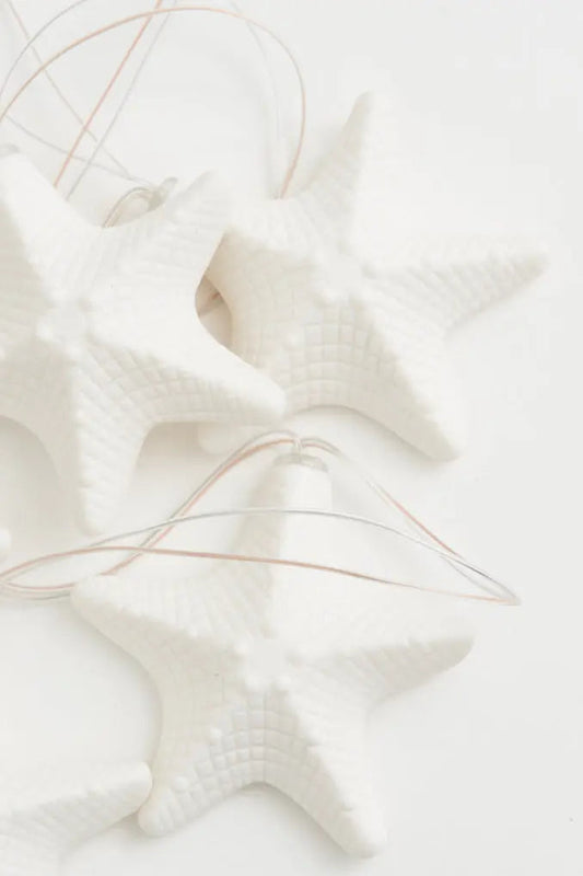 Guirnalda de farolillos con estrellas en resina