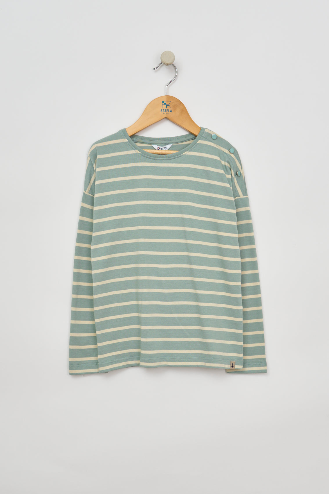 T-shirt enfants manches longues rayé avec des boutons décoratifs sur l’épaule