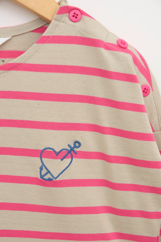T-shirt manches longues à rayures avec des boutons sur l’épaule