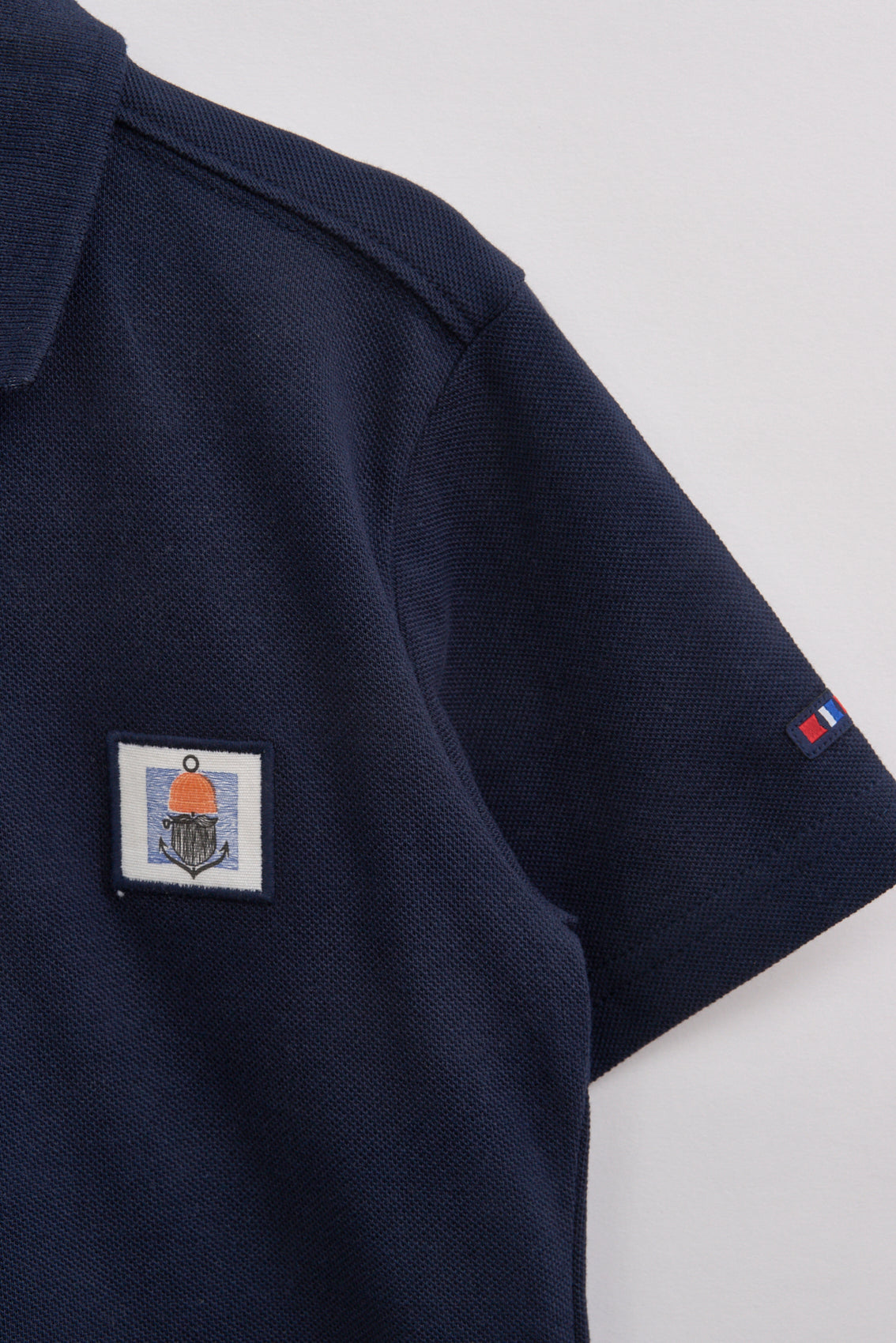 Polo de algodón piqué OEKO-TEX con parche marinero