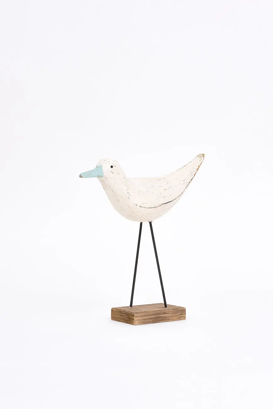 Original figura de pájaro blanco y pico en contraste turquesa