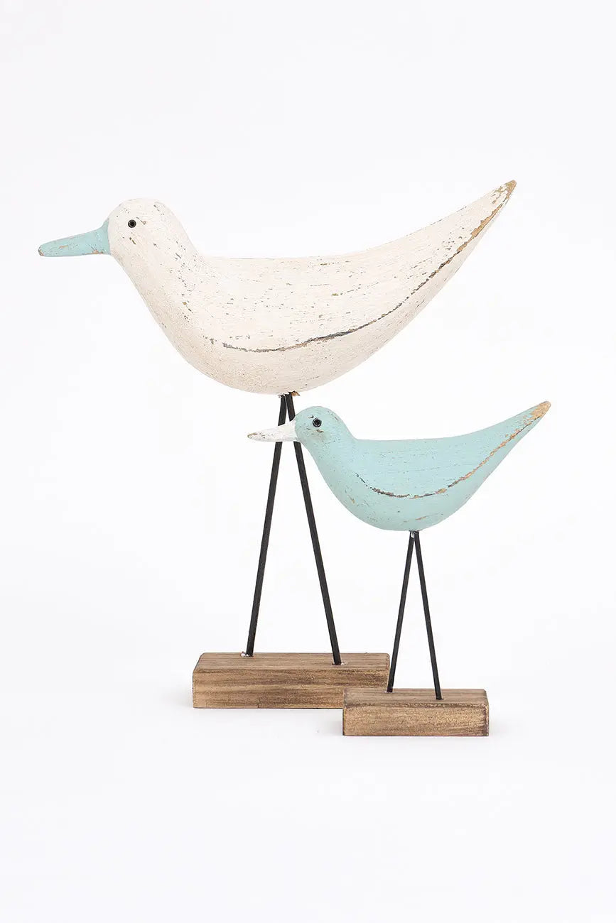 Original figura de pájaro blanco y pico en contraste turquesa