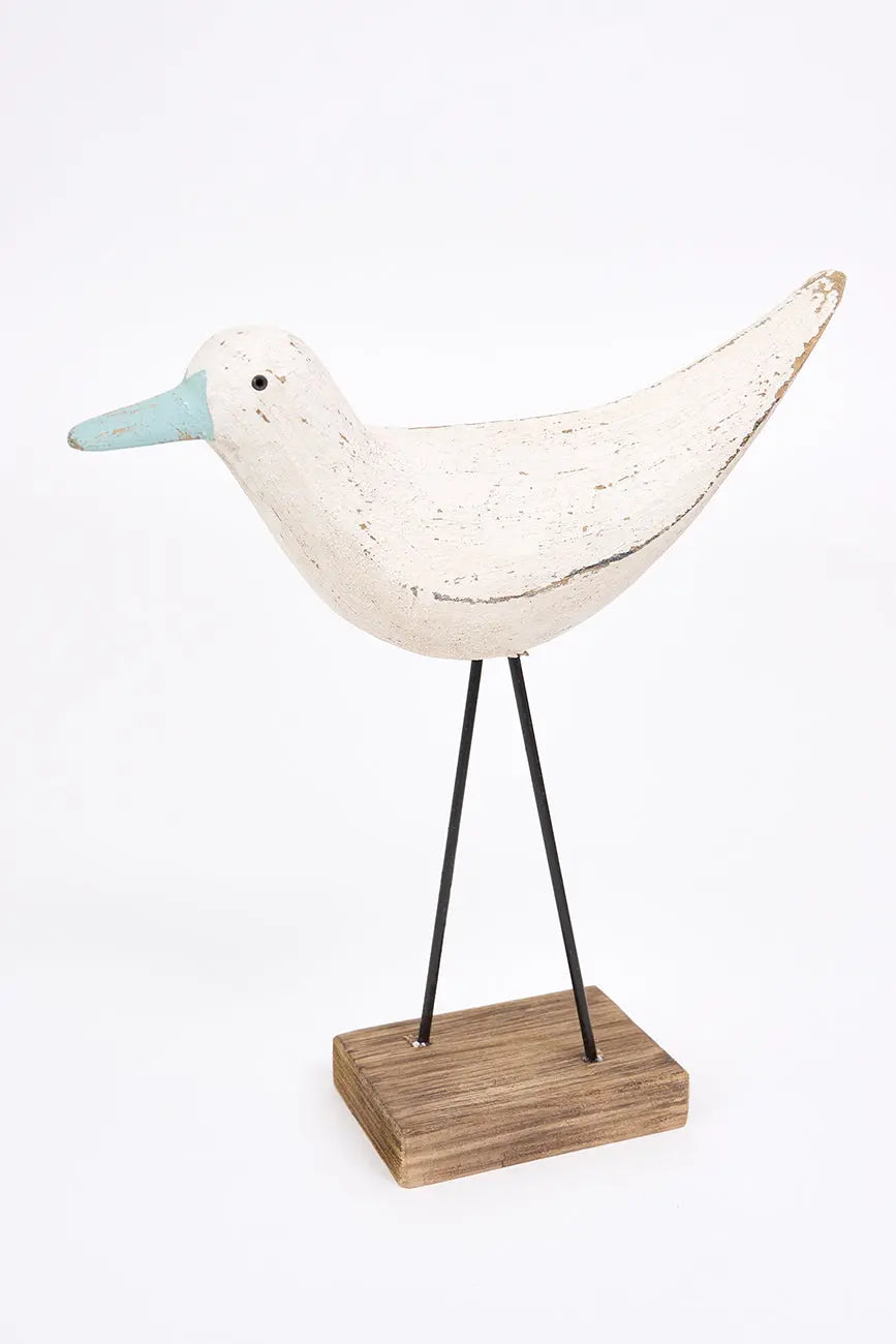 Original figura de pájaro blanco y pico en contraste turquesa