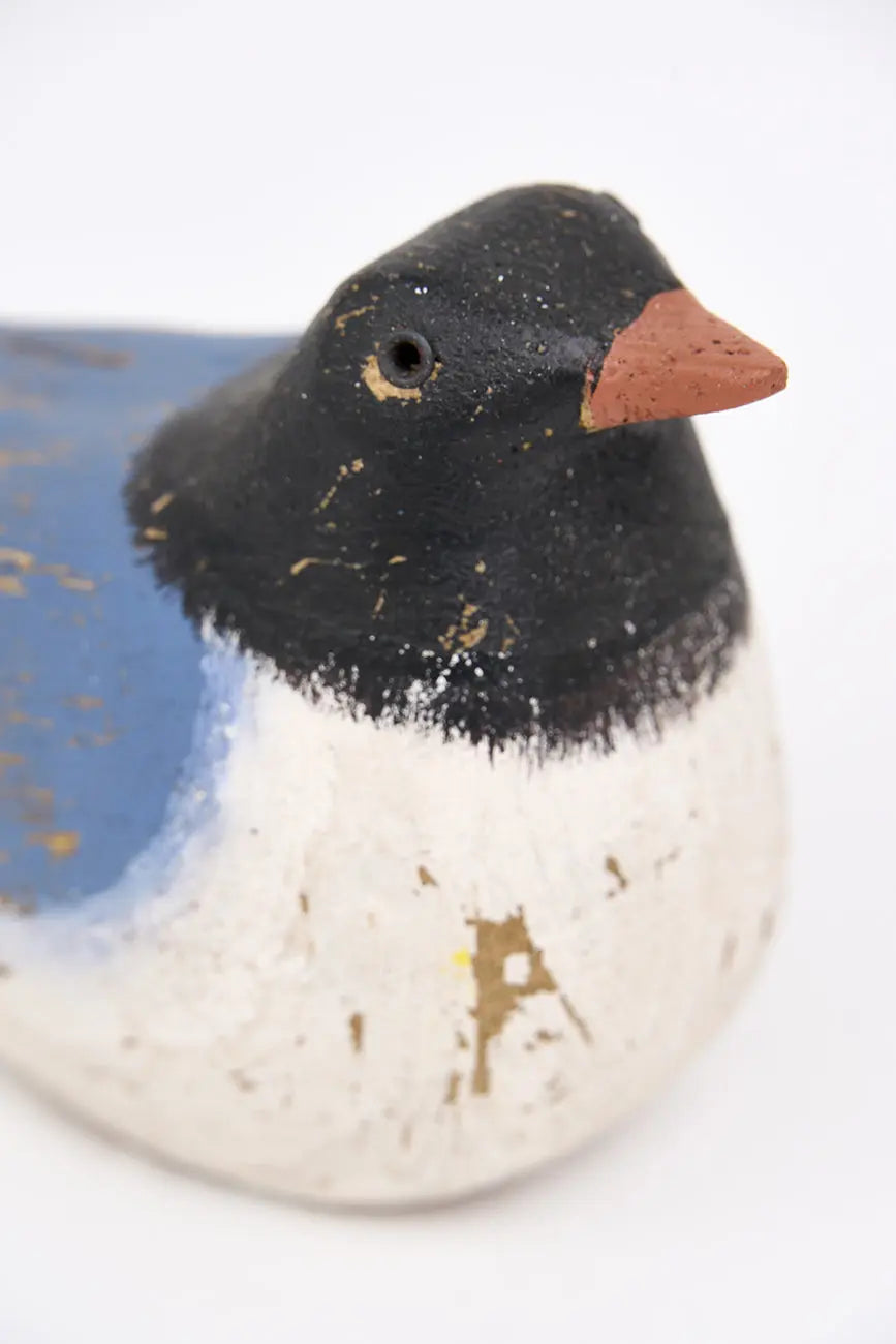 Pájaro de madera con acabado envejecido 