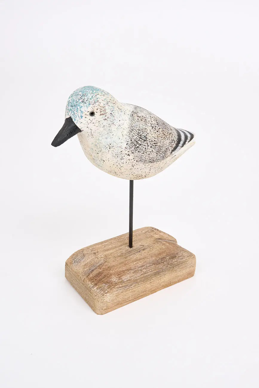 Wooden bird in white, black and grey tones