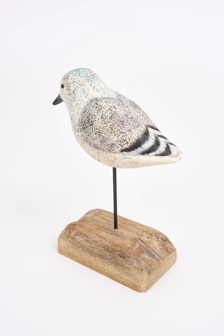 Wooden bird in white, black and grey tones