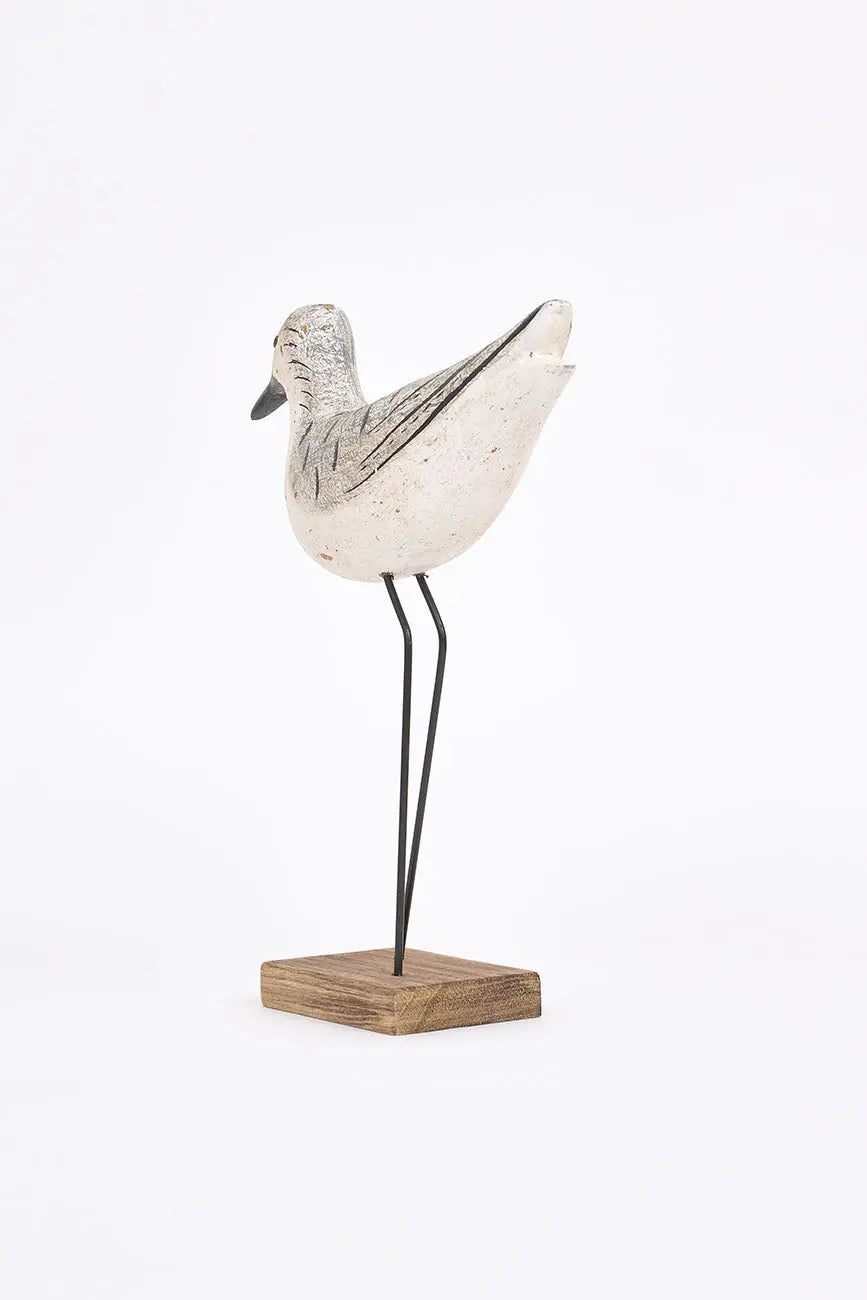 Wooden bird in white, black and grey tones