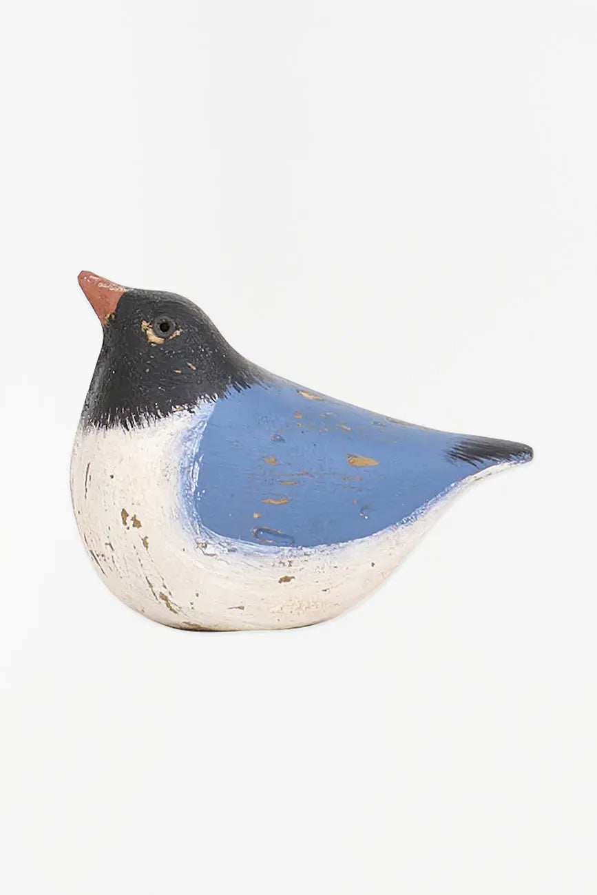 Small wooden bird with an aged touch