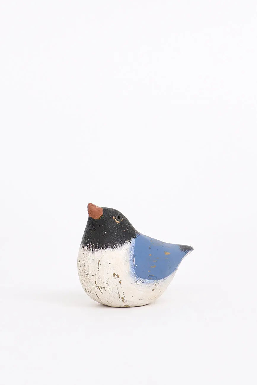 Small wooden bird with an aged touch