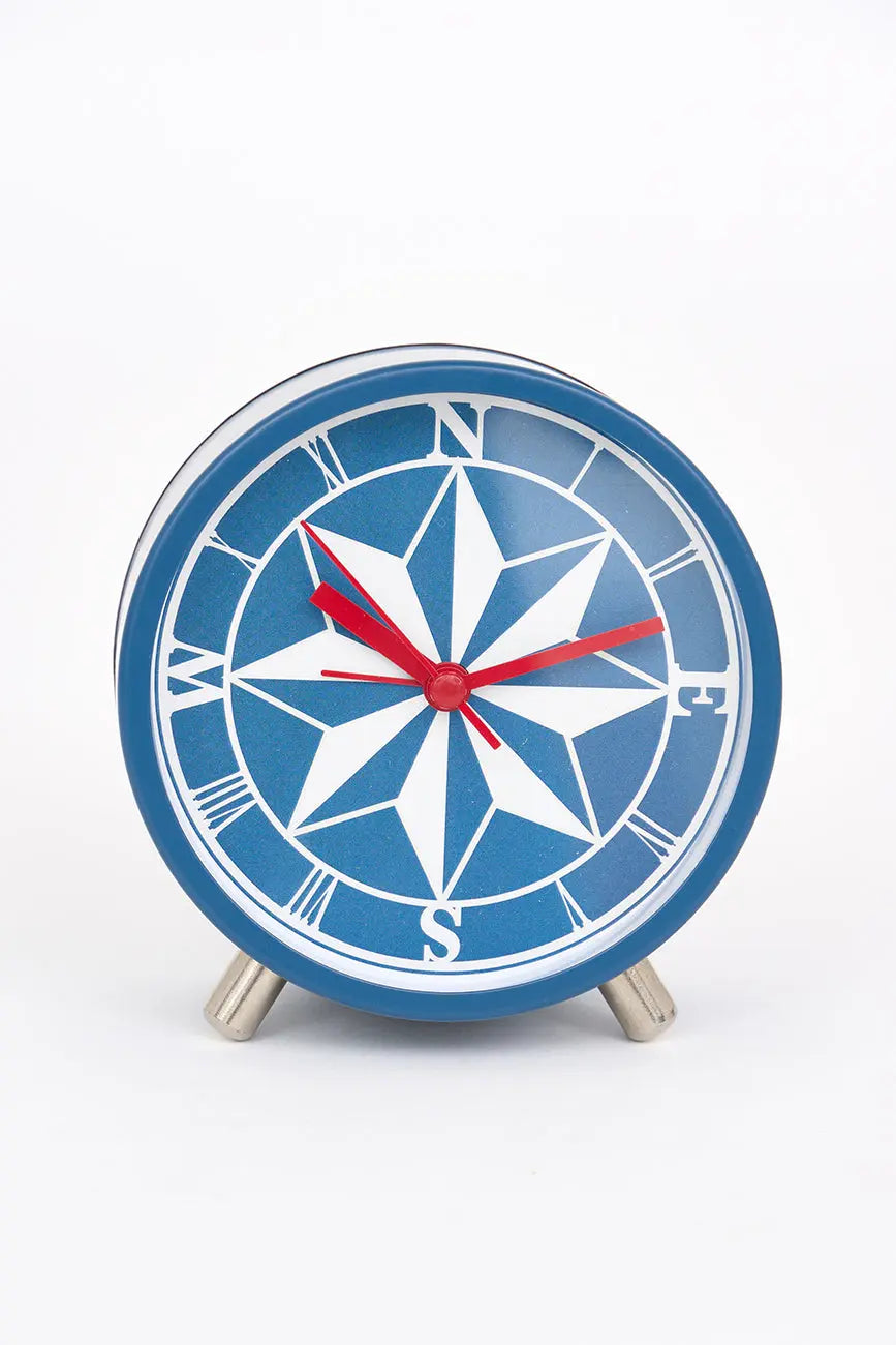 Pequeño reloj de mesa rosa de los vientos