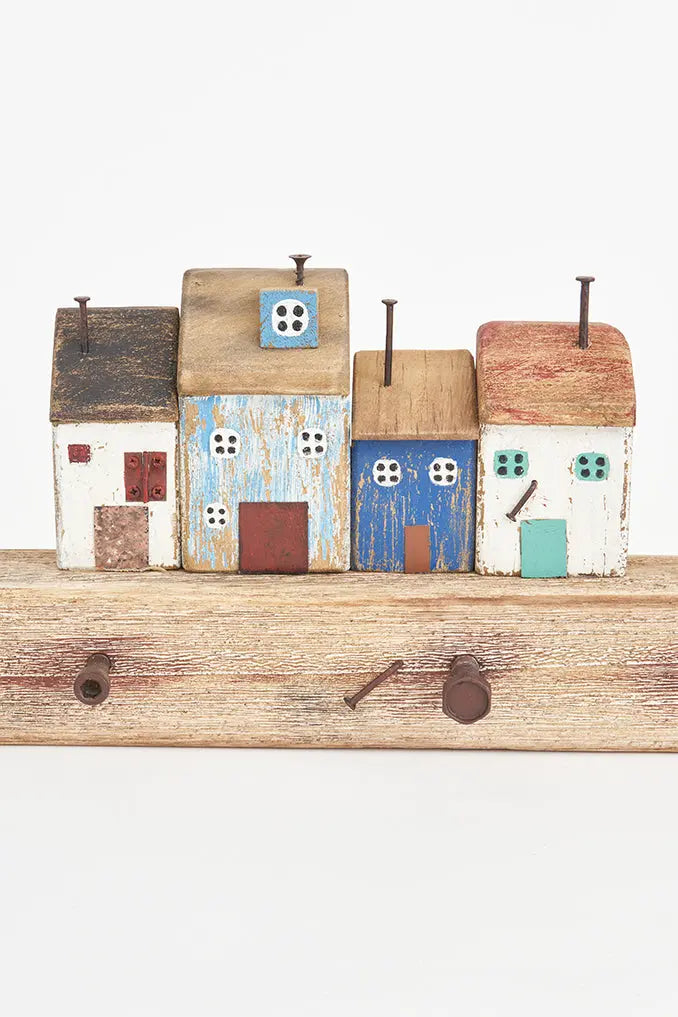 Coat rack houses, boat and lighthouse port