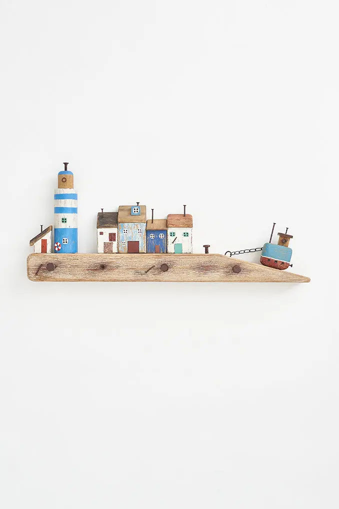 Coat rack houses, boat and lighthouse port