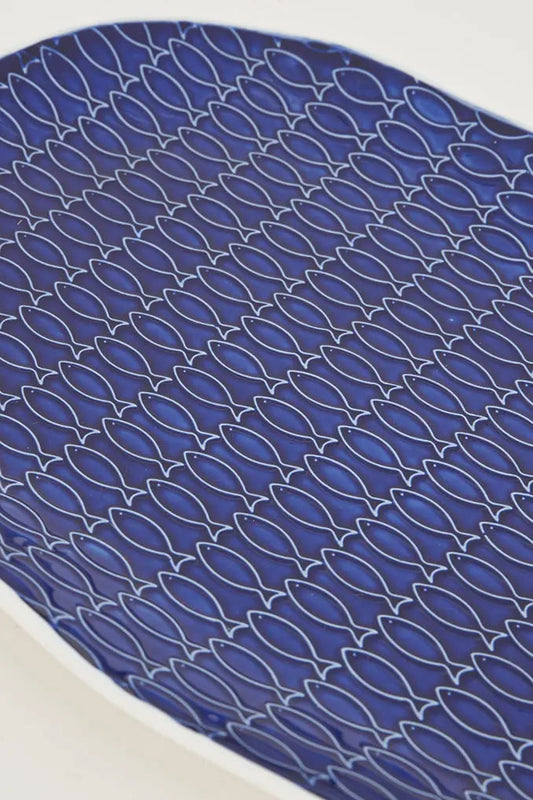 Assiette poissons en céramique bleue