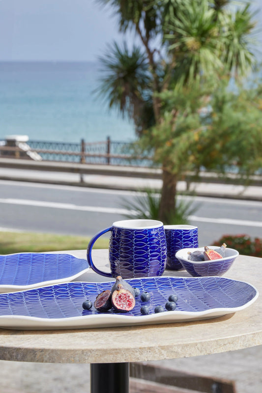Assiette poissons en céramique bleue