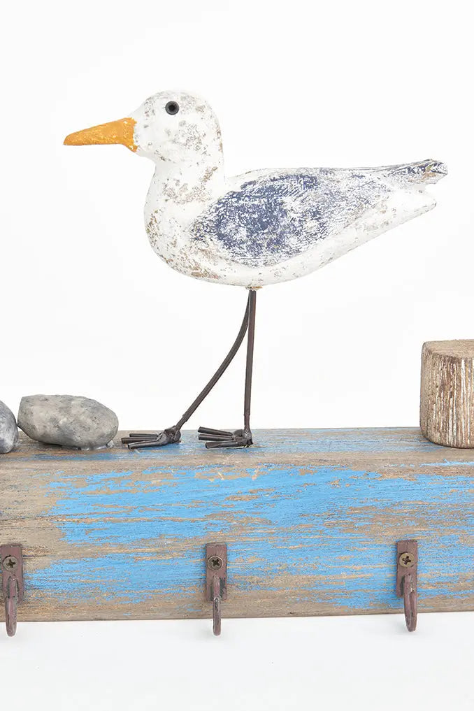 Porte-clés avec un oiseau sur du bois