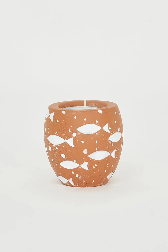 Portavelas de cemento con peces