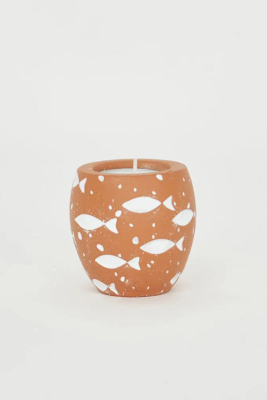 Portavelas de cemento con peces