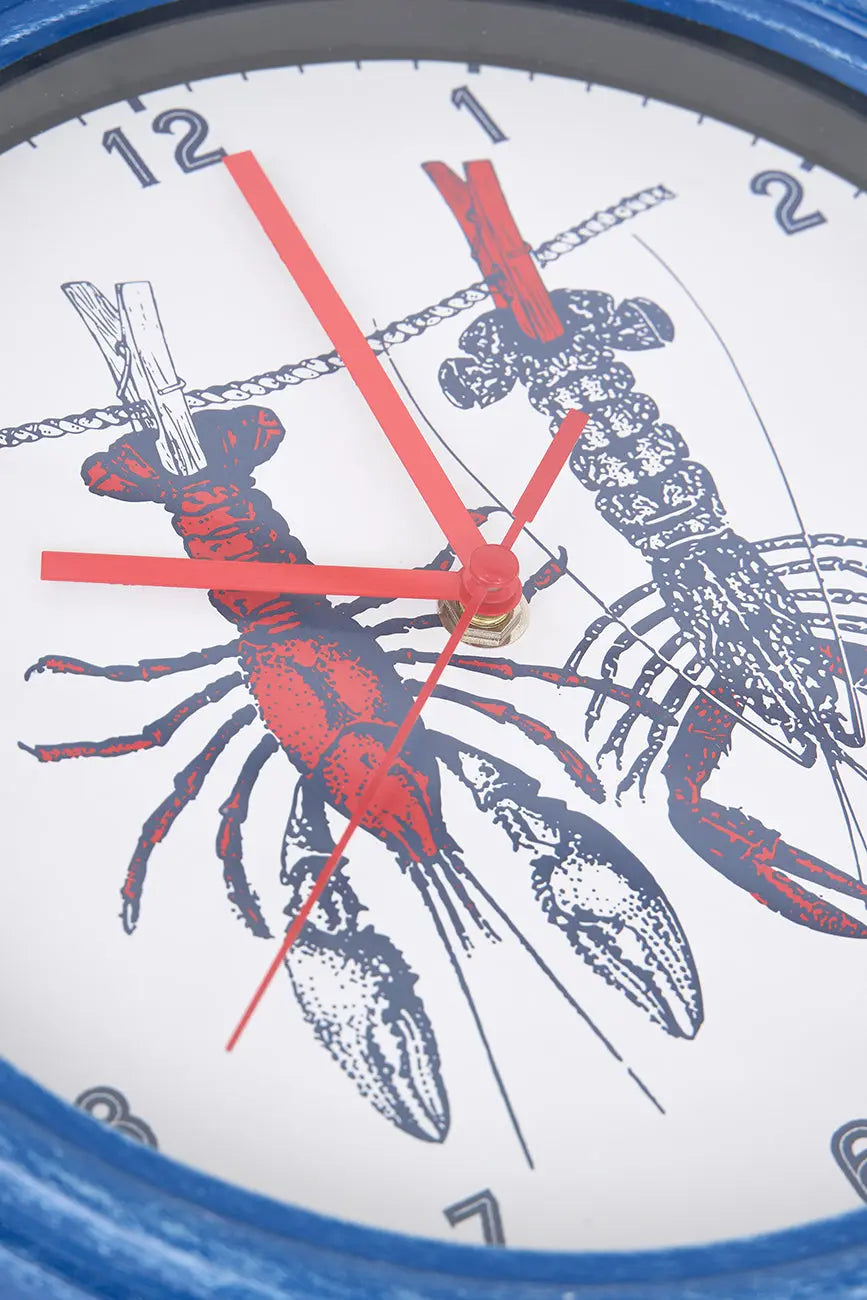 Reloj con diseño de langostas