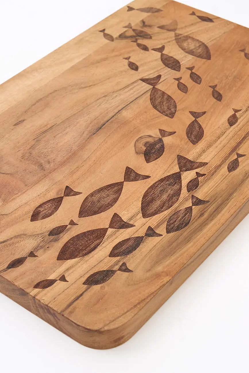 Tabla de cocina con banco de peces