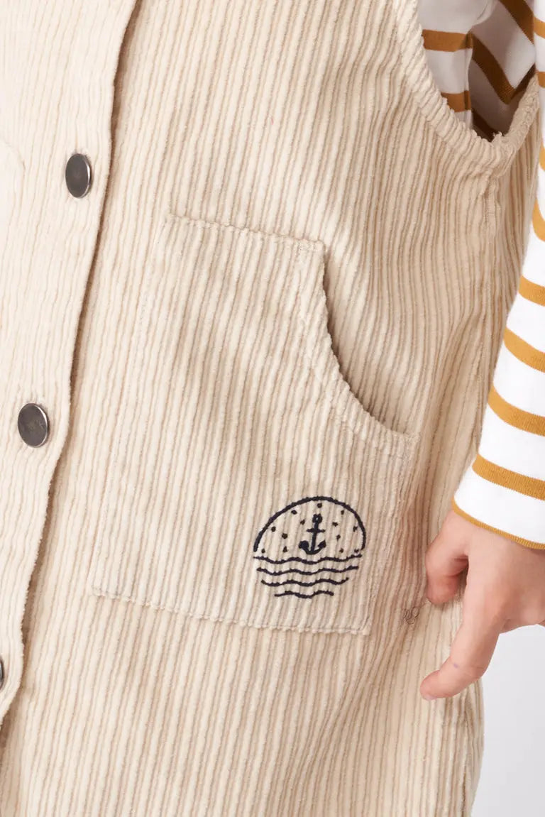 Corduroy pinafore dress with buttons and front pockets