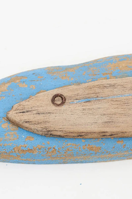 Wooden mural in the shape of a fish